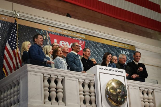 Levi's employees and owners ring the Opening Bell on the floor of the New York Stock Exchange. Photo: Spencer Platt/Getty Images