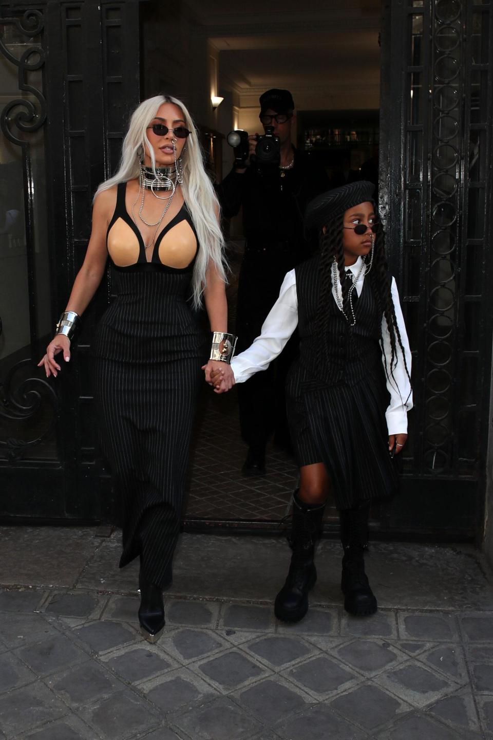 Kim Kardashian and daughter North West leaving the Jean Paul Gaultier fashion show in Paris