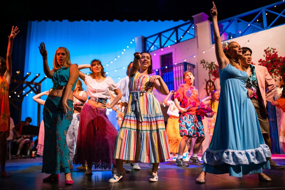 Students perform at a dress rehearsal for an upcoming PSD performance of 'Mamma Mia!' at Fossil Ridge High School in Fort Collins on Tuesday.