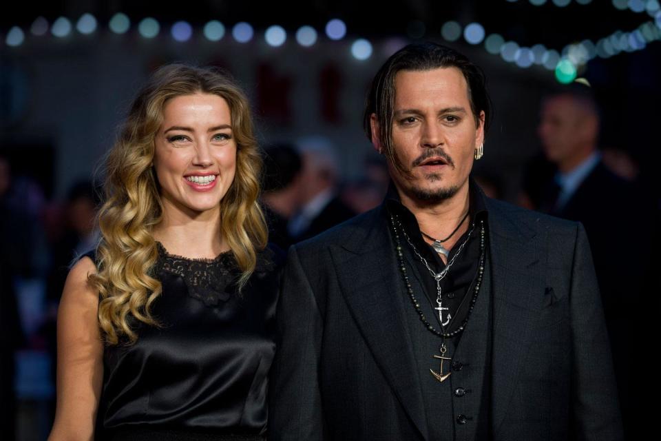 Johnny Depp and ex-wife Amber Heard in 2015 (JUSTIN TALLIS/AFP/Getty Images)