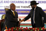 South Sudan's President Salva Kiir (R) and Ugandan President Yoweri Kaguta Museveni attend the opening of the National Dialogue committee in Juba, South Sudan May 22, 2017. REUTERS/Jok Solomun