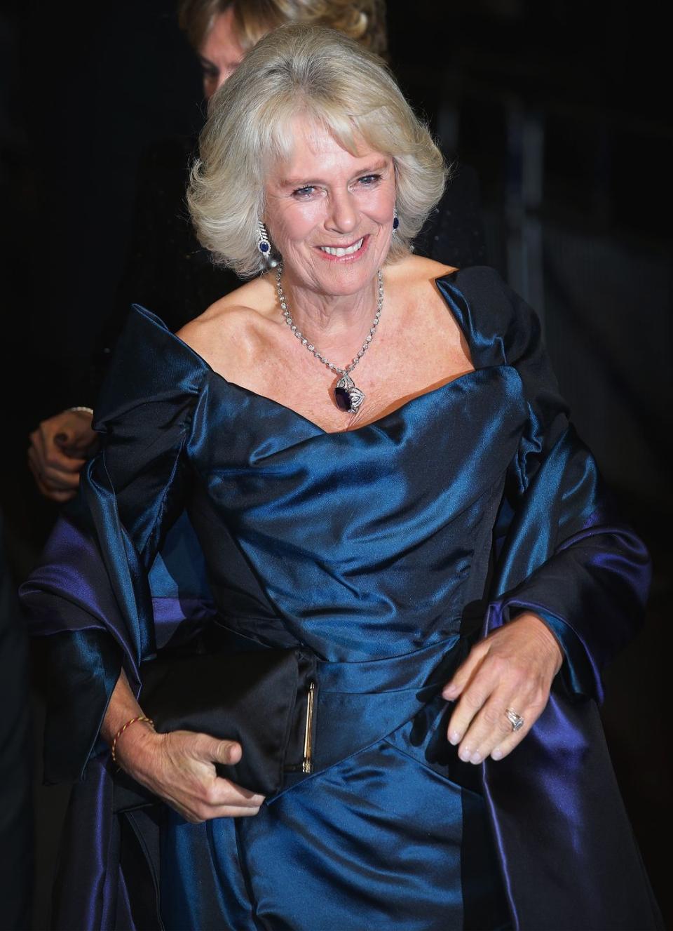 <p>Camilla wore this large floral sapphire and diamond pendant to a 2013 performance in London. </p>