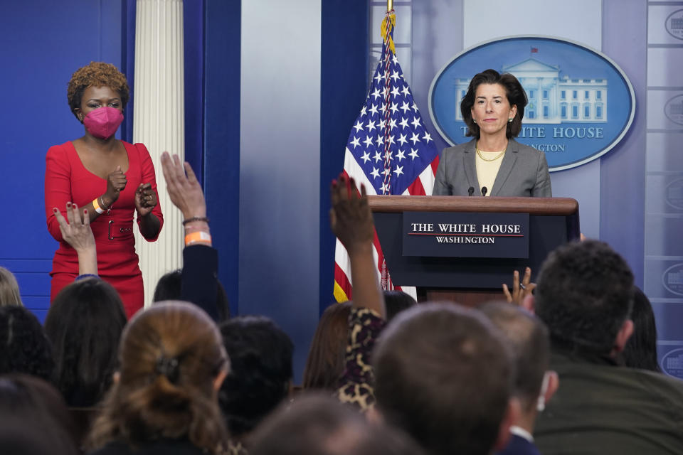 White House deputy press secretary Karine Jean-Pierre, left, calls on a reporter to ask Commerce Secretary Gina Raimondo, right, a question during the daily briefing at the White House in Washington, Tuesday, Nov. 9, 2021. (AP Photo/Susan Walsh)