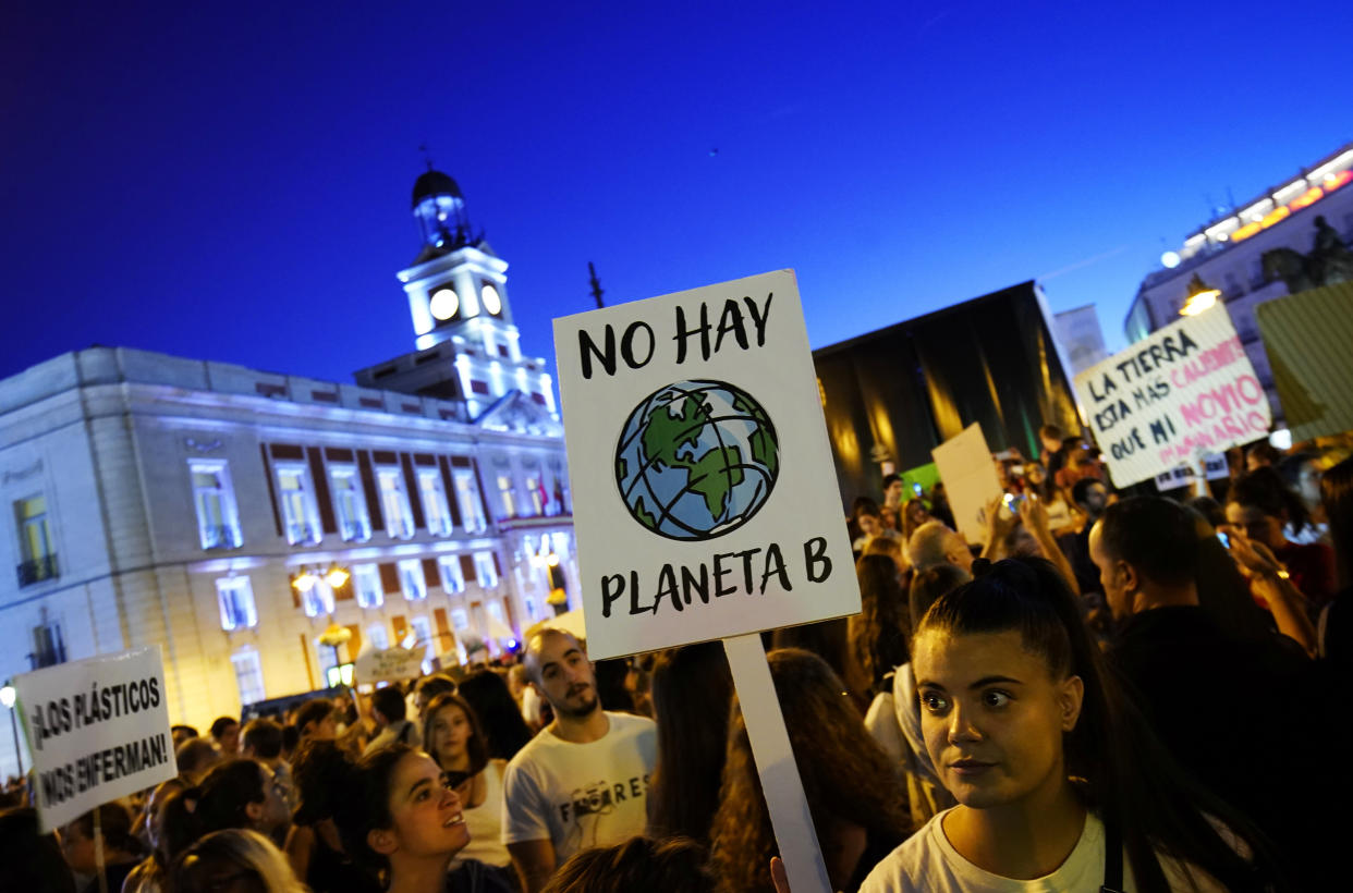 A woman holds a placard reading "There is no Planet B" during a protest demanding global politicians take urgent action to fight climate change in Madrid in September. (Photo: Juan Medina / Reuters)