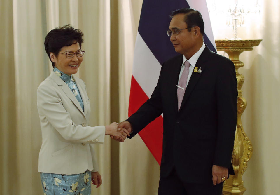 Hong Kong Chief Executive Carrie Lam, left, meets Thailand's Prime Minister Prayuth Chan-ocha at the government house in Bangkok, Thailand Friday, Nov. 29, 2019. (Jorge Silva/Pool Photo via AP)