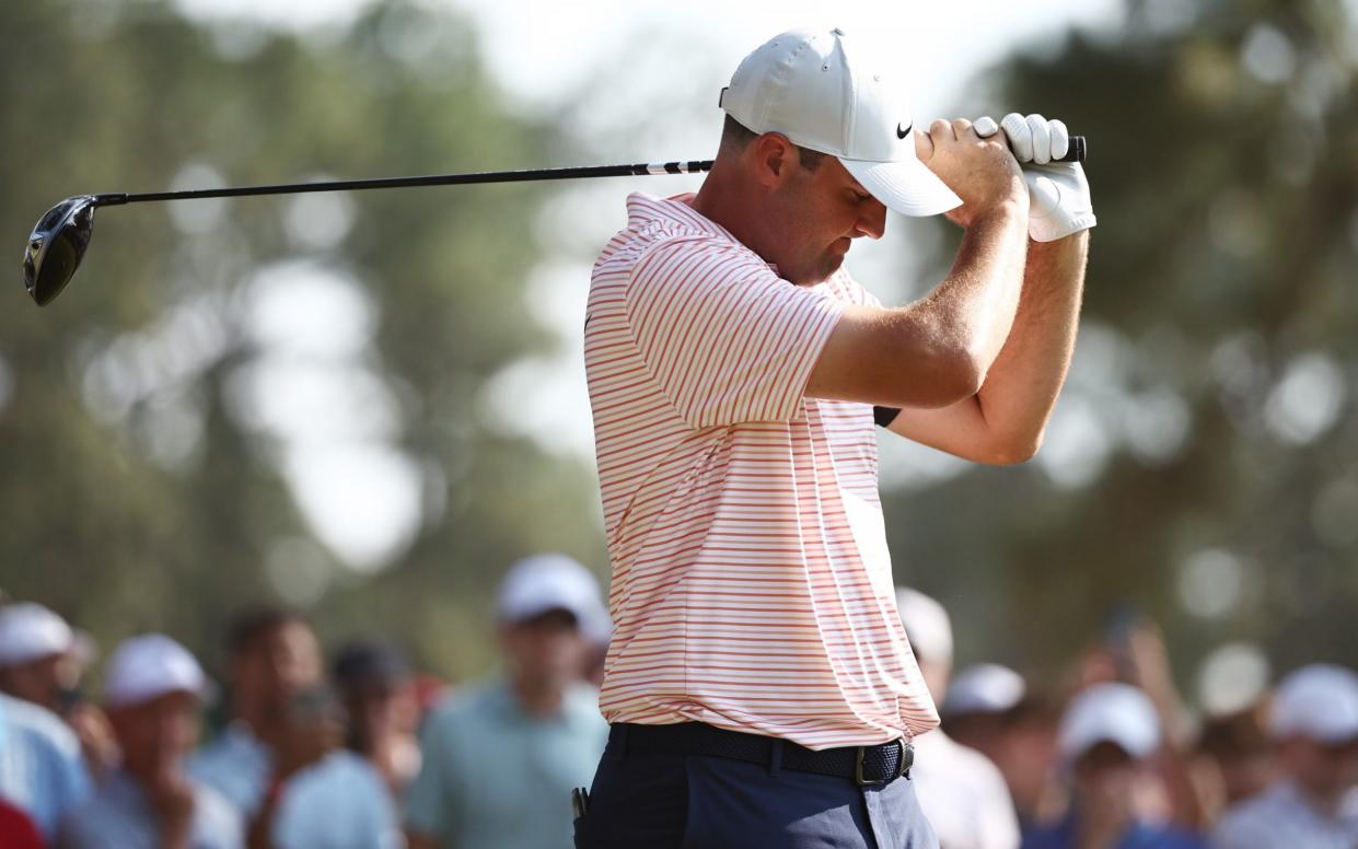 Scottie Scheffler reacts to a wayward drive at the US Open at Pinehurst