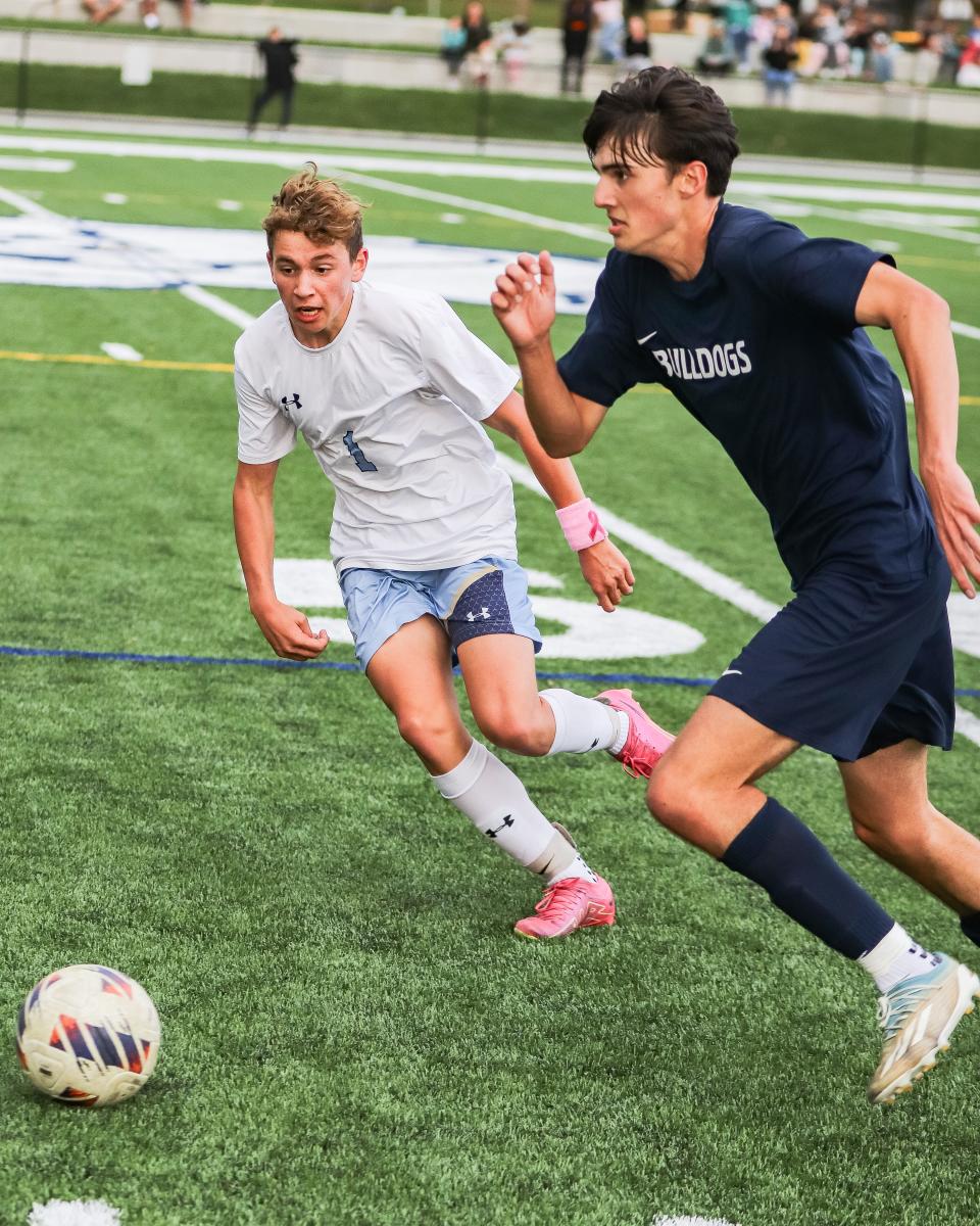 Rockland's Josh Deprete is defended by East Bridgewater's Brady Hill during a game on Monday, Oct. 16, 2023.