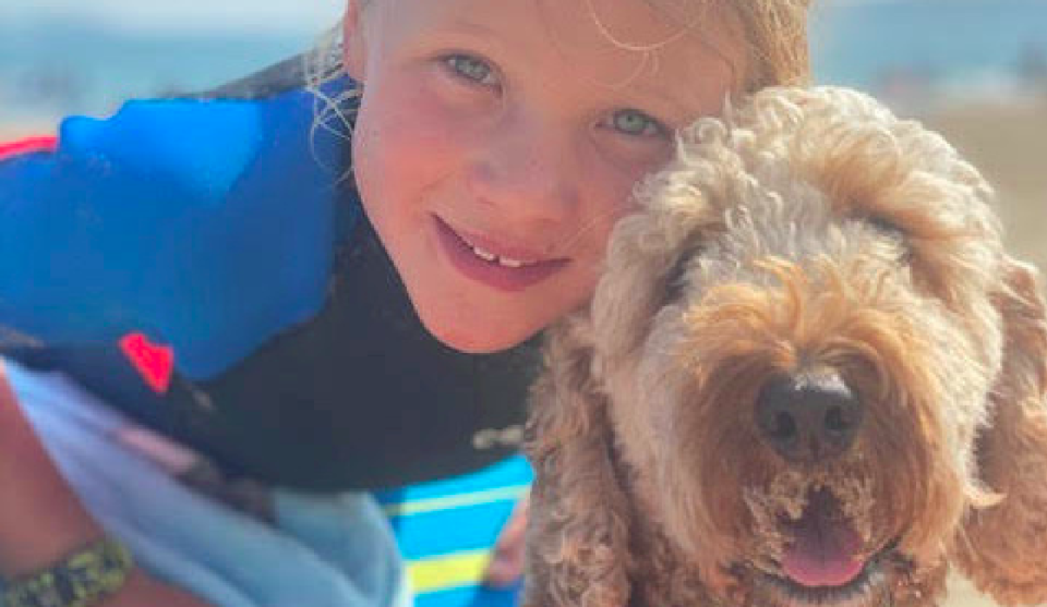 Scarlett Malley with Benji, who passed away minutes after arriving at a vets. (SWNS)