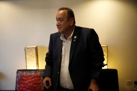 The winner of Guatemala's presidential election, Alejandro Giammattei, talks during an interview with Reuters in Guatemala City,