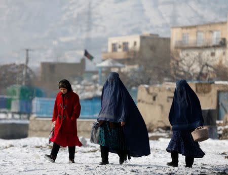 Women walk along a street in Kabul, Afghanistan January 16, 2017. REUTERS/Omar Sobhani/Files