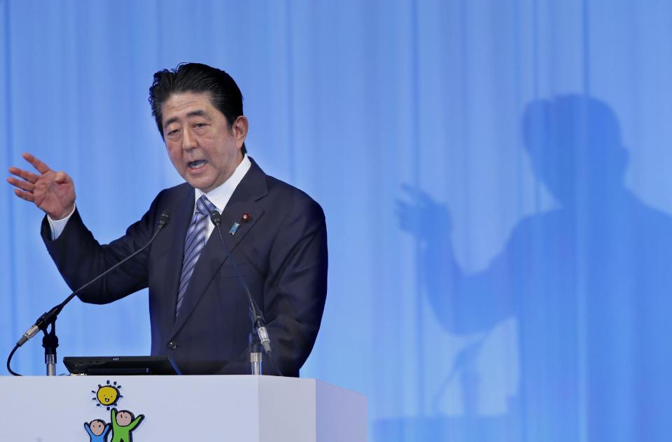 Japanese Prime Minister Shinzo Abe makes a speech during his ruling Liberal Democratic Party's annual convention at a hotel in Tokyo, Sunday, March 5, 2017. Japan's ruling party approved a change in party rules Sunday that could pave the way for Prime Minister Shinzo Abe to become the country's longest-serving leader in the post-World War II era. (AP Photo/Shizuo Kambayashi)