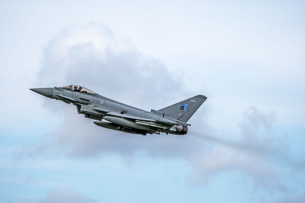 RAF Typhoon jets were sent to escort a passenger plane to Manchester Airport (PA Wire)