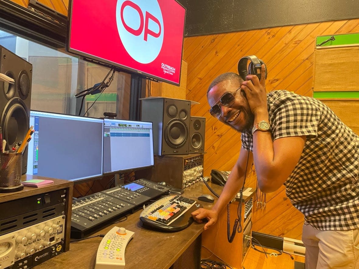 Chijioke Okorie fell in love with music as a young boy in a church choir. Years later, he's making music in a studio in Fredericton.  (Sophia Etuhube/CBC - image credit)