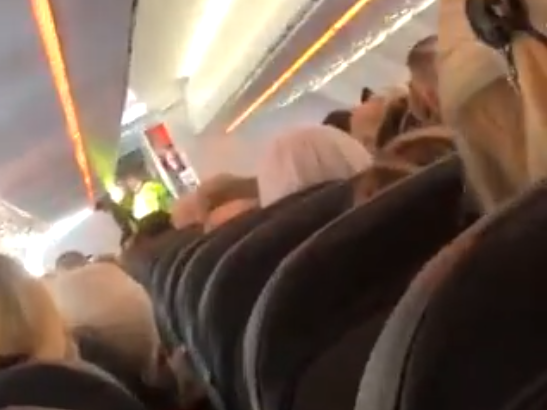 Passengers had to remain in their seats while police boarded the plane for safety checks: Kieran Bridge