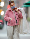 <p>Helena Christensen dons a cuddly pink topper to run errands in N.Y.C.</p>