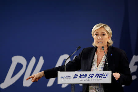 Marine Le Pen, French National Front (FN) political party leader and candidate for French 2017 presidential election, attends a political rally in Arcis-sur-Aube, near Troyes, France April 11, 2017. REUTERS/Benoit Tessier