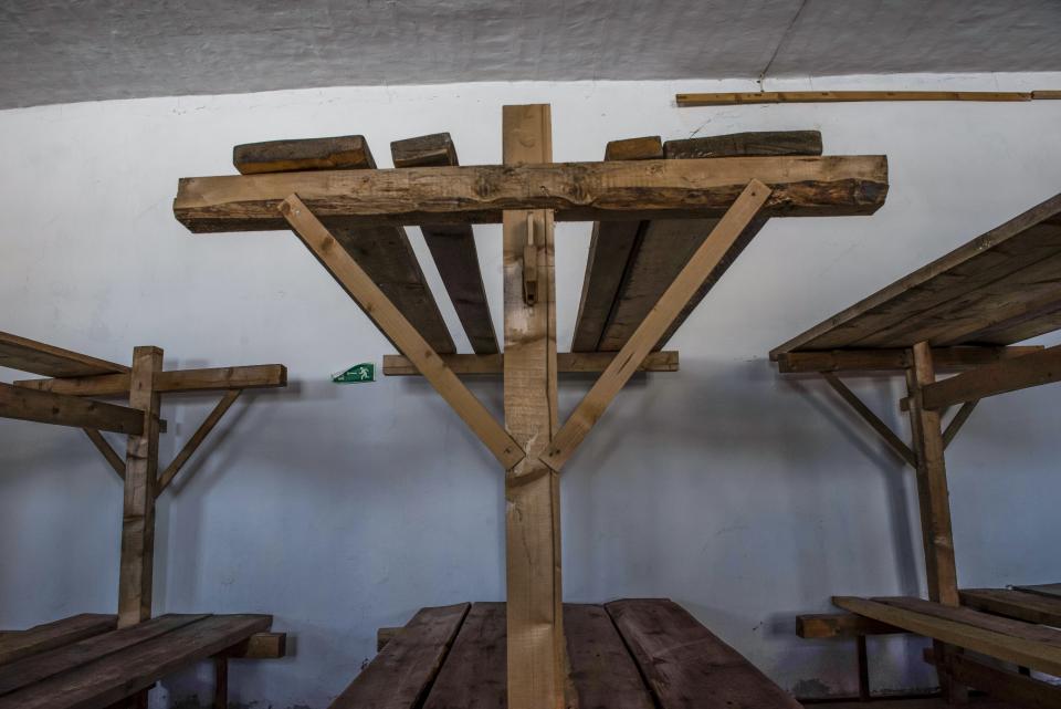 FILE - Prisoners' beds stand in a barracks in a museum housed in a former prison camp, some 110 kilomeeters (69 miles) northeast of the Siberian city of Perm, Russia, on March 6, 2015. Historians estimate that under Soviet dictator Josef Stalin, 700,000 people were executed during the height of his purges in 1937-38. In modern Russia, former inmates, their relatives and human rights advocates paint a bleak picture of the prison system that is descended from the USSR's gulag. For political prisoners, life inside is a grim reality of physical and psychological pressure. (AP Photo/Alexander Agafonov, File)