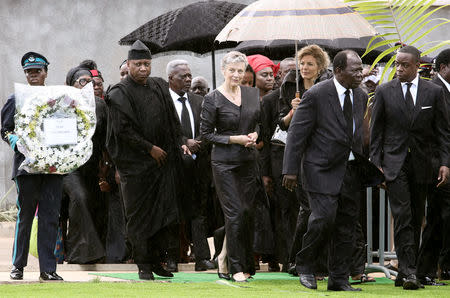 Wife Nane Maria Annan and children of the former United Nations Secretary General Kofi Annan, who died in Switzerland, arrive for the burial service at the Military Cemetery in Burma Camp in Accra, Ghana September 13, 2018. Reuters/Francis Kokoroko