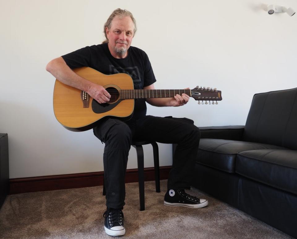 Mark Barrett, nephew of Syd Barrett, with the guitar once owned by the Pink Floyd founder member (Chris Parnham/PA) (PA Media)