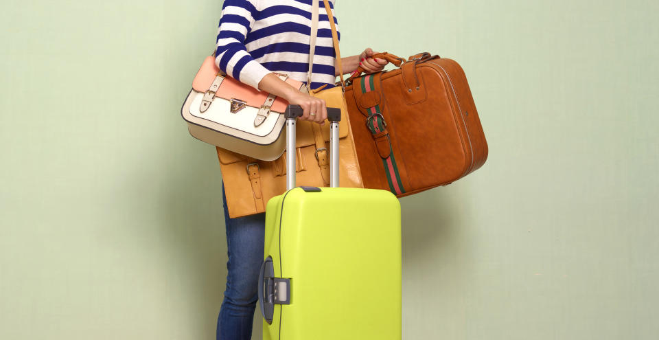 woman carrying luggage