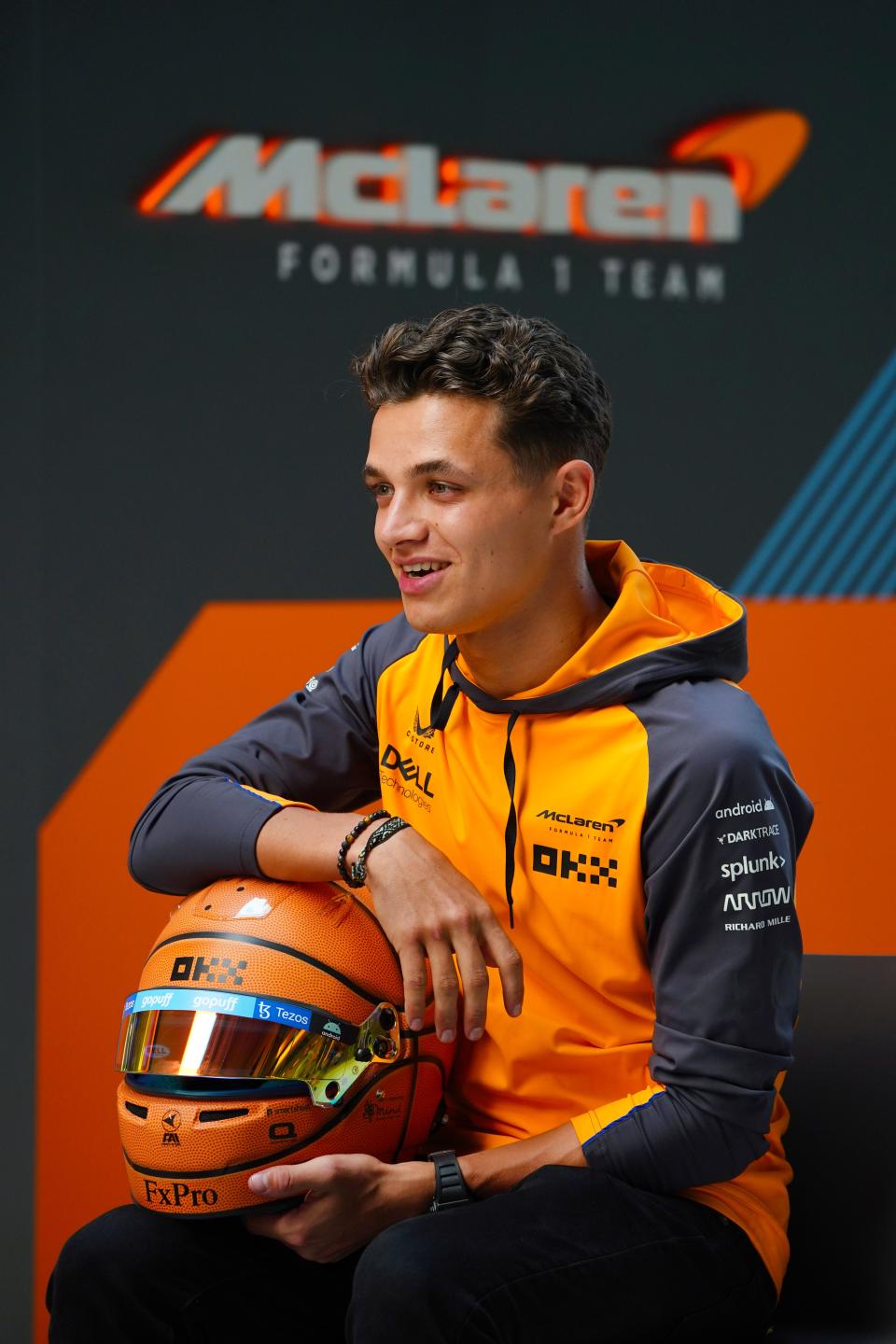 May 5, 2022; Miami Gardens, Florida, USA; McLaren driver Lando Norris of Britain talks with a reporter during an interview during preparations for the Miami Grand Prix at Miami International Autodrome. Mandatory Credit: John David Mercer-USA TODAY Sports