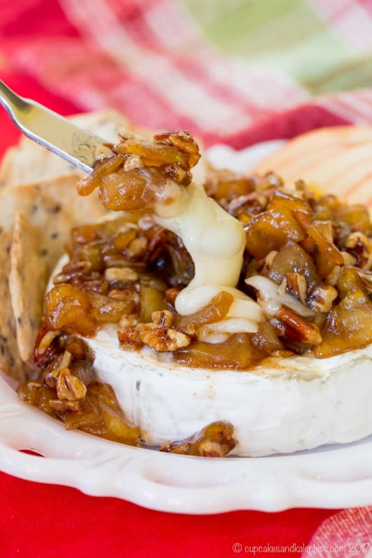 <p>Cupcakes & Kale Chips</p><p>Sticky sweet apples and pecans perfectly balance the melty brie.</p><p><strong>Get the recipe: <a href="https://cupcakesandkalechips.com/apple-pecan-baked-brie/" rel="nofollow noopener" target="_blank" data-ylk="slk:Caramelized Apple Pecan Baked Brie;elm:context_link;itc:0;sec:content-canvas" class="link ">Caramelized Apple Pecan Baked Brie</a></strong></p><p><strong>Related: <a href="https://www.yahoo.com/lifestyle/84-sweet-savory-apple-recipes-163715734.html" data-ylk="slk:84 Sweet and Savory Apple Recipes to Make This Fall;elm:context_link;itc:0;sec:content-canvas;outcm:mb_qualified_link;_E:mb_qualified_link;ct:story;" class="link  yahoo-link">84 Sweet and Savory Apple Recipes to Make This Fall</a></strong></p>