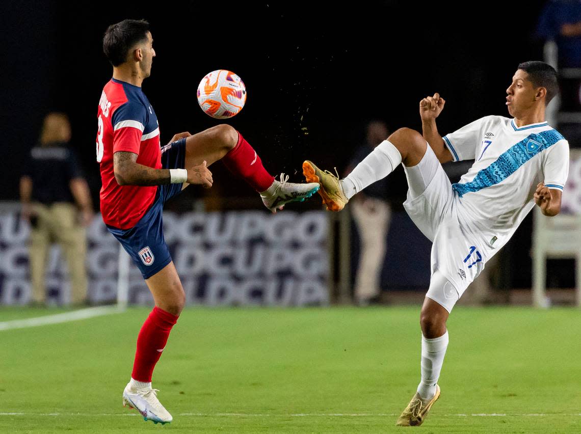 Cuba defender Jorge Corrales (13) and Guatemala midfielder Óscar Castellanos (17) compete for the ball in the first half of their CONCACAF Gold Cup 2023 match at DRV PNK Stadium on Tuesday, June 27, 2023, in Fort Lauderdale, Fla.