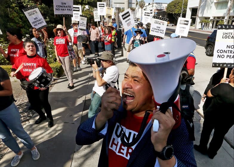 Santa Monica, CA - Members of Unite Here! Local 11 hotel workers union and members of the Writers Guild of America picket together outside the Fairmont Miramar Hotel in Santa Monica on Thursday, July 13, 2023. (Luis Sinco / Los Angeles Times)