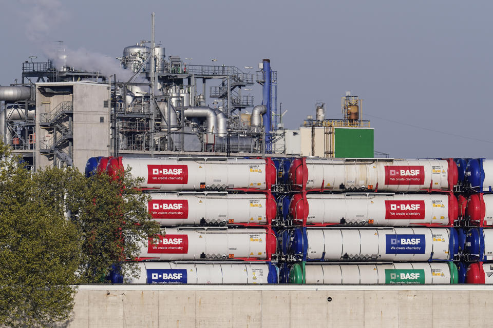 Containers labeled "BASF" stand on the site of the chemical company BASF in Ludwigshafen, Germany, Thursday, April 28, 2022. The company would be severely affected by a potential Russian gas supply stop. (Uwe Anspach/dpa via AP)