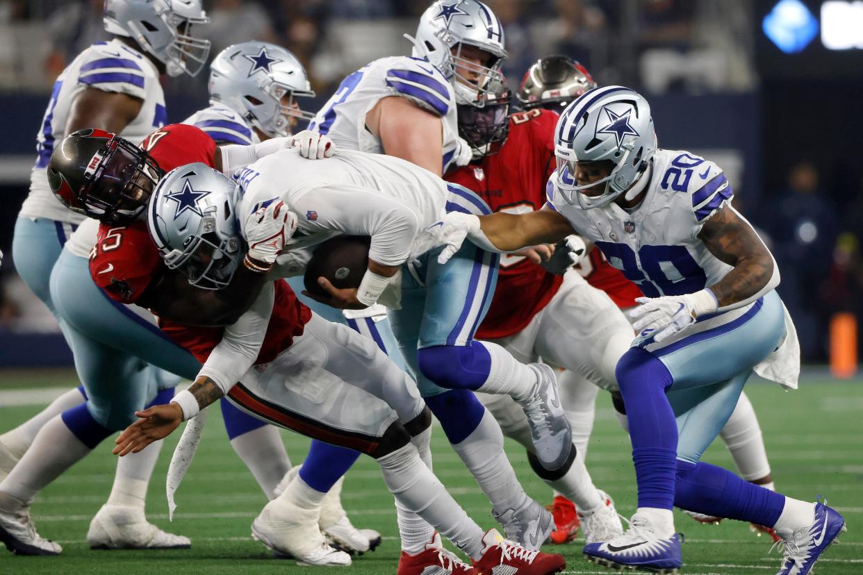 The Dallas Cowboys and Tampa Bay Buccaneers face off on Monday Night Football on MLK Day, the last of six NFL playoff games in a busy weekend in sports.