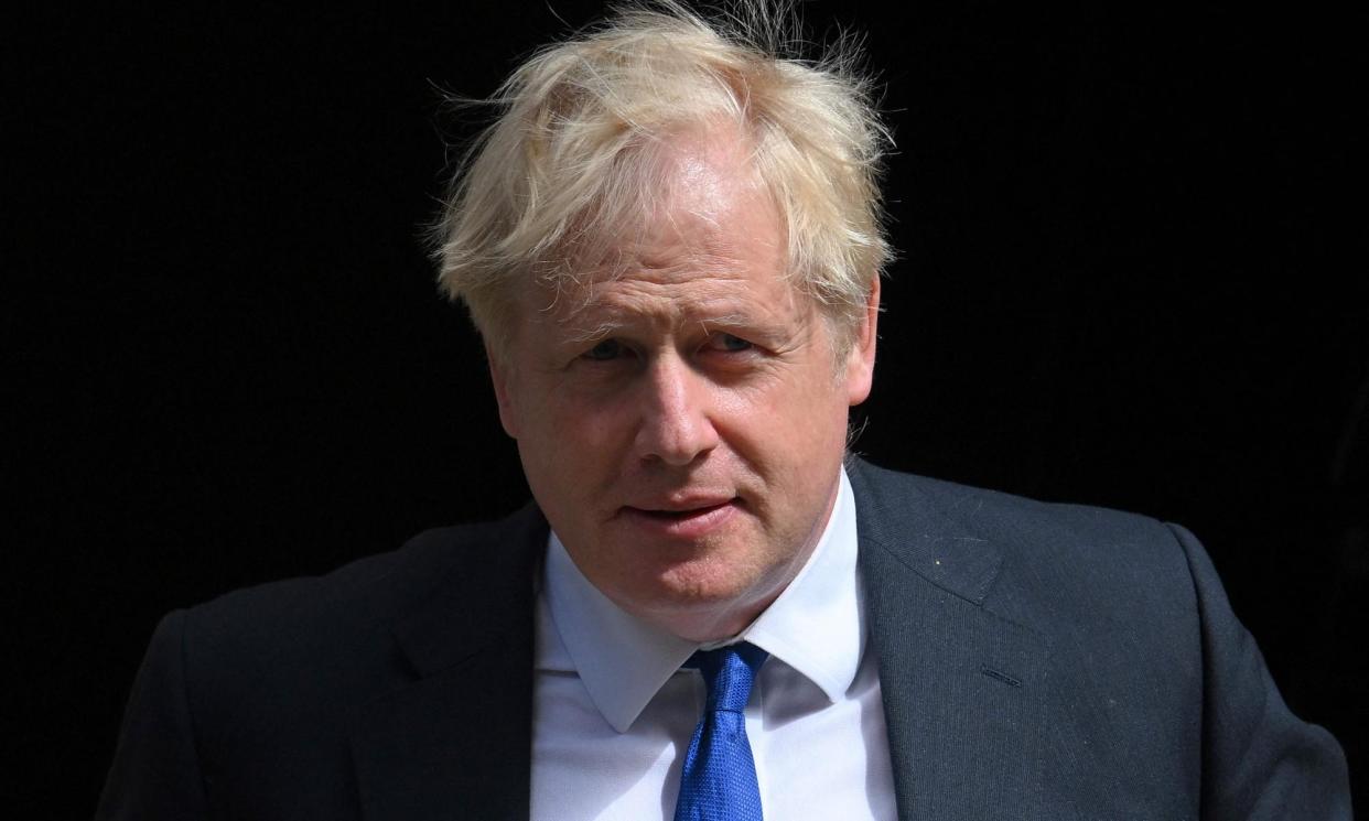 <span>Johnson has been recording personal endorsements in the form of video messages that have been shared on social media by Conservative candidates.</span><span>Photograph: Daniel Leal/AFP/Getty Images</span>