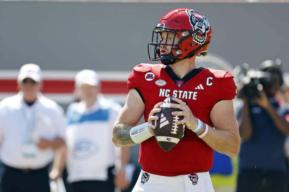 North Carolina State quarterback Brennan Armstrong (5) prepares to throw the ball against Virginia Military during the first half of an NCAA college football game in Raleigh, N.C., Saturday, Sept. 16, 2023. (AP Photo/Karl B DeBlaker)
