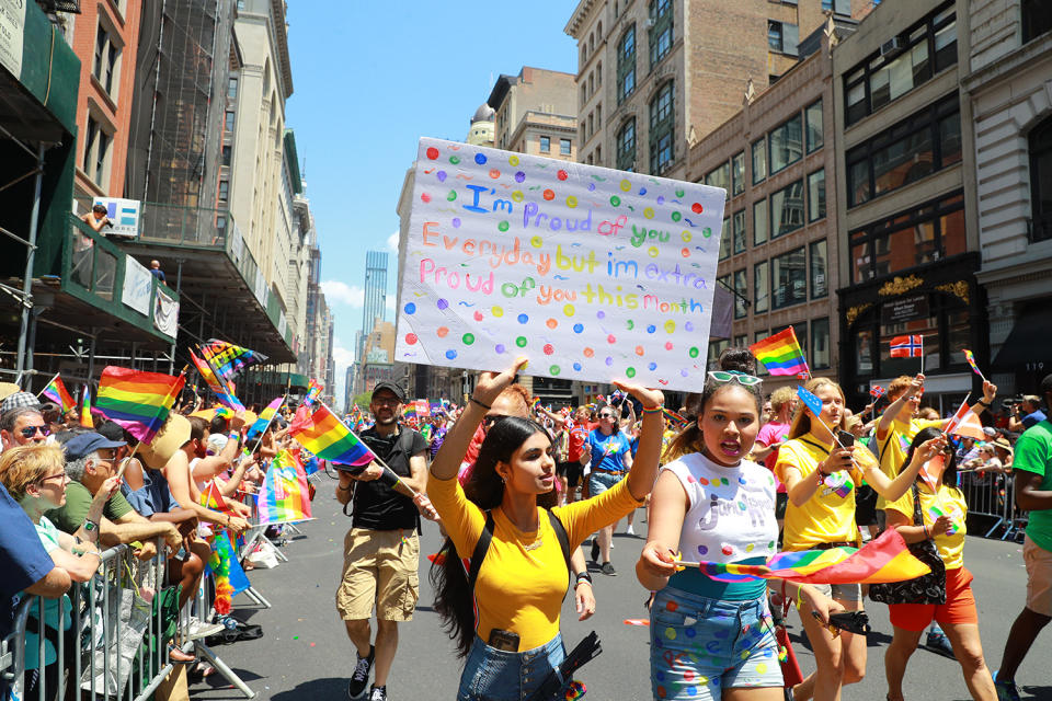 A marcher carries a sign in support of gay rights during the N.Y.C. Pride Parade in New York on June 30, 2019. (Photo: Gordon Donovan/Yahoo News)