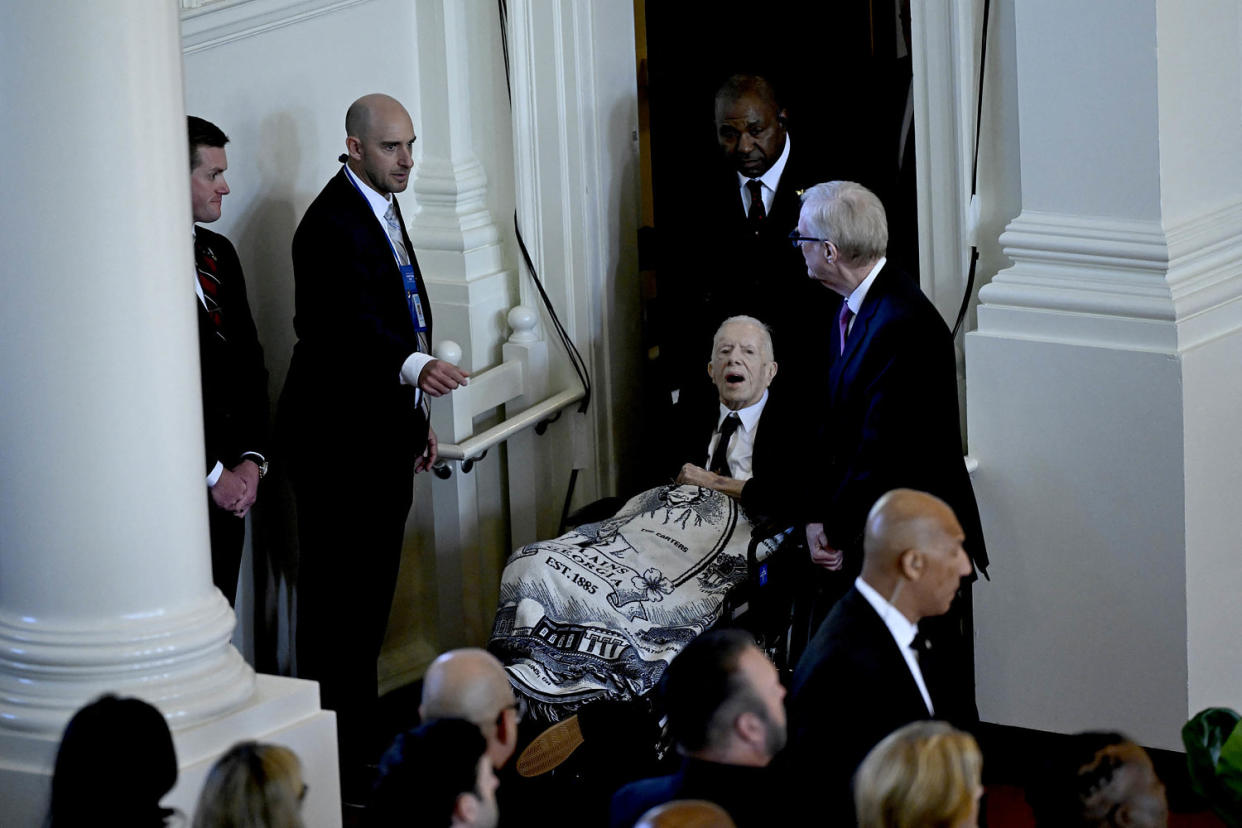 Former US President Jimmy Carter arrives for a tribute service for former US First Lady Rosalynn Carter, at Glenn Memorial Church in Atlanta, Georgia, on November 28, 2023. Carter died on November 19, aged 96, just two days after joining her husband in hospice care at their house in Plains. (Andrew Caballero Reynolds / AFP via Getty Images)