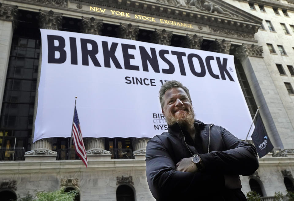 Birkenstock CEO Oliver Reichert poses for photos outside the New York Stock Exchange, prior to his company's IPO, Wednesday, Oct. 11, 2023. (AP Photo/Richard Drew)