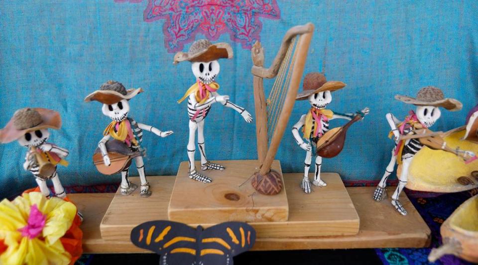 The Dia de los Muertos festival was held at the Mission Plaza on Saturday. A detail of a “skeleton mariachi band” created by Susan Lara of Atascadero was a tribute to her favorite singer, Violeta Parra Sandoval. The figures are made with walnut shells and driftwood.