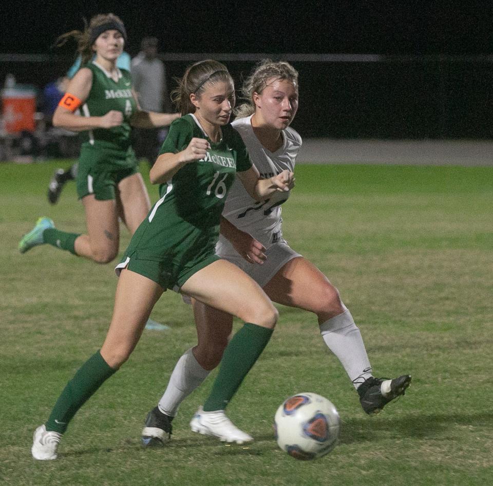 McKeel Academy's Mackenzie Thornton (16) dribbles the ball as Academy of the Holy NamesÕ Bentley Barnes (24) tries to defend during their FHSAA Class 4A Region 3 Final girls soccer match at McKeel Academy in Lakeland Tuesday night. February 14, 2023