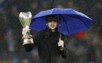 Football Soccer Britain - Leicester City v Manchester City - Premier League - King Power Stadium - 10/12/16 Mark Selby comes on to the pitch at half time to parade the UK Snooker Championship trophy he recently won Reuters / Darren Staples Livepic EDITORIAL USE ONLY. No use with unauthorized audio, video, data, fixture lists, club/league logos or "live" services. Online in-match use limited to 45 images, no video emulation. No use in betting, games or single club/league/player publications. Please contact your account representative for further details.