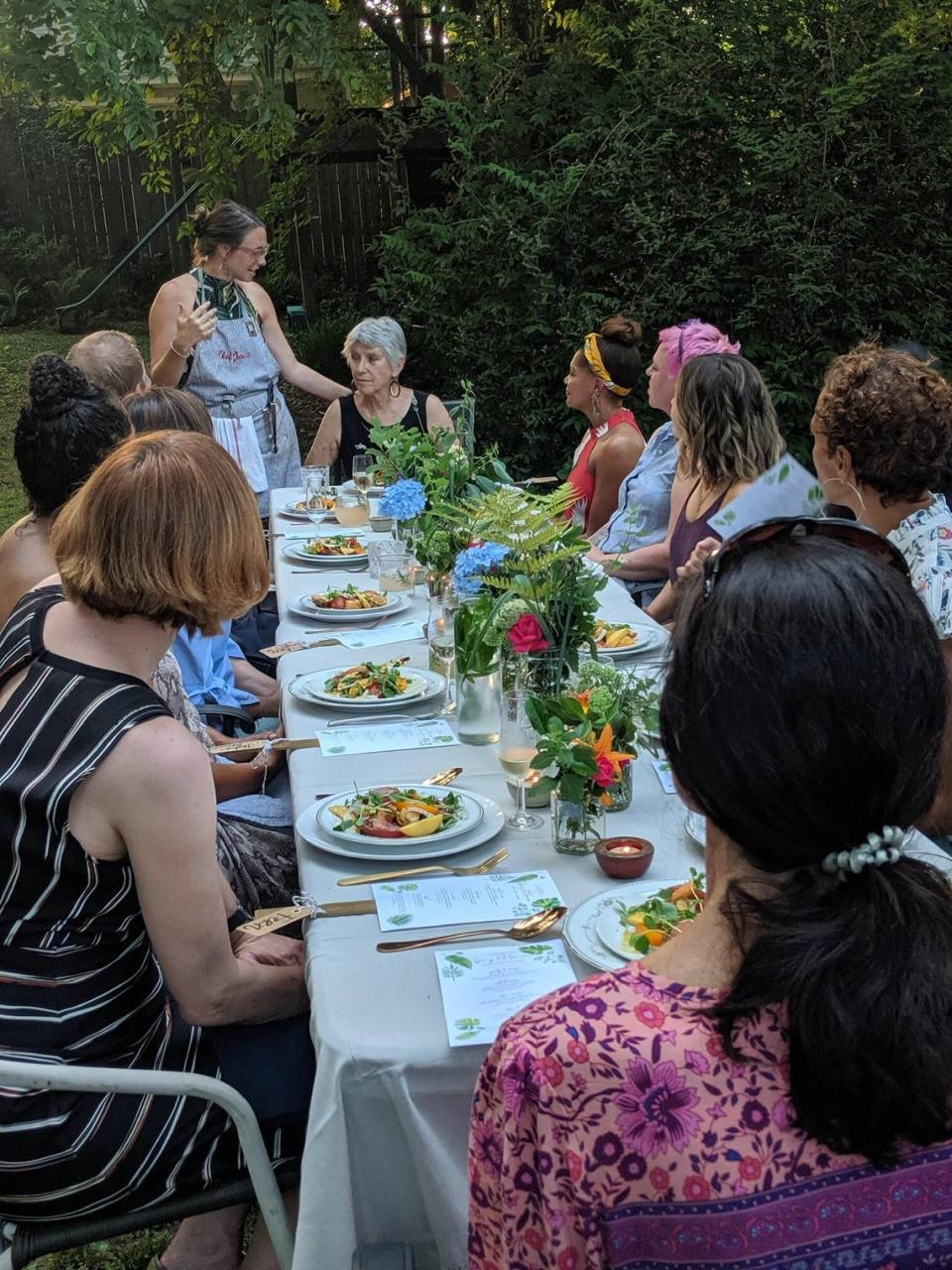 This, says Jess Masanotti (pictured standing), was her very first Mortar & Pestle dinner, hosted by her friend Linda Minor (seated at the table’s head) at her home in Charlotte’s Elizabeth neighborhood. Partnering with Kriska Woods and Manny Carandang of Charlotte Remedy, they curated and created a four-course dinner with signature cocktails and drink pairings. “This was such a special night,” Masanotti says, “one that truly kick-started my journey to becoming a professional chef.”