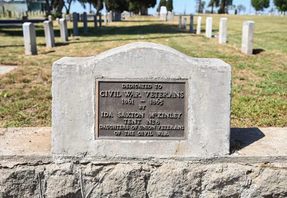 A plaque dedicated to Civil War Veterans at the Veterans Liberty Cemetery on Belmont Avenue near Hughes is shown on Friday, April 28, 2023. The cemetery started in 1896 had been intended for veterans of conflicts dating back to the Civil War.