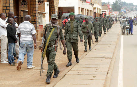 Congolese soldiers patrol to prevent civilians from protesting against the government's failure to stop the killings and inter-ethnic tensions in the town of Butembo, North Kivu province in the Democratic Republic of Congo, August 25, 2016. REUTERS/Kenny Katombe