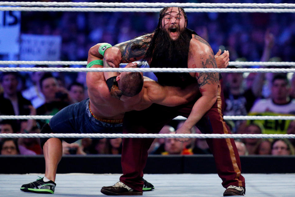 John Cena, left, and Bray Wyatt, right, compete during Wrestlemania XXX at the Mercedes-Benz Super Dome in New Orleans on Sunday, April 6, 2014. (Jonathan Bachman/AP Images for WWE)