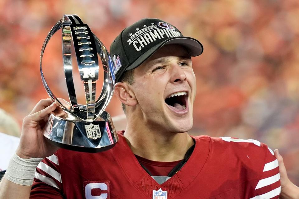San Francisco 49ers quarterback Brock Purdy celebrates the 49ers' NFC championship win against the Detroit Lions.