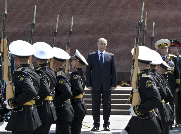 Russian President Vladimir Putin attends a ceremony in memory of those killed during WWII as he takes part in a wreath laying ceremony at the Tomb of Unknown Soldier in Moscow, Russia, Tuesday, June 22, 2021, marking the 80th anniversary of the Nazi invasion of the Soviet Union. (Alexei Nikolsky, Sputnik, Kremlin Pool Photo via AP)