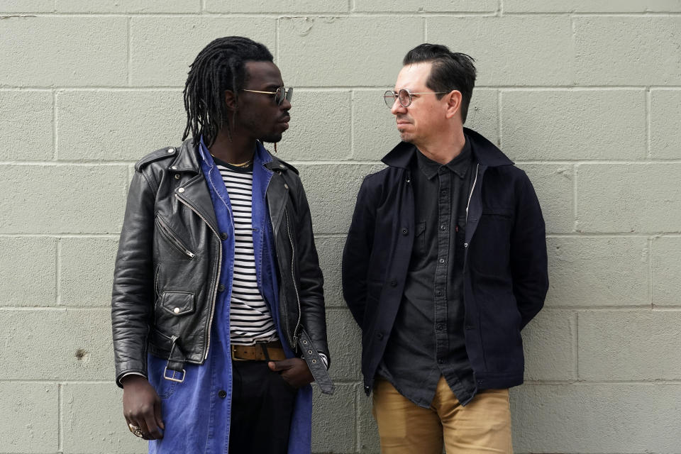 Adrian Quesada, left, and Eric Burton, of Black Pumas, pose for a portrait in Austin, Texas on Feb. 5, 2021. Their deluxe debut album is nominated for album of the year at the 2021 Grammy Awards and their single “Colors” is nominated for record of the year and best American roots performance. (AP Photo/Eric Gay)