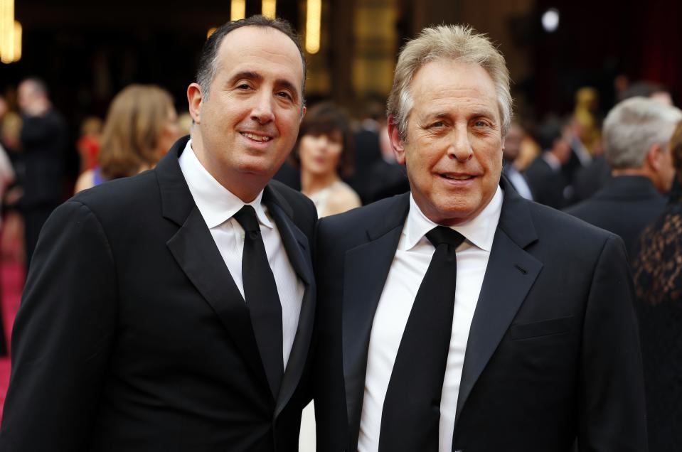 "American Hustle" producers Richard Suckle (L) and Charles Roven arrive