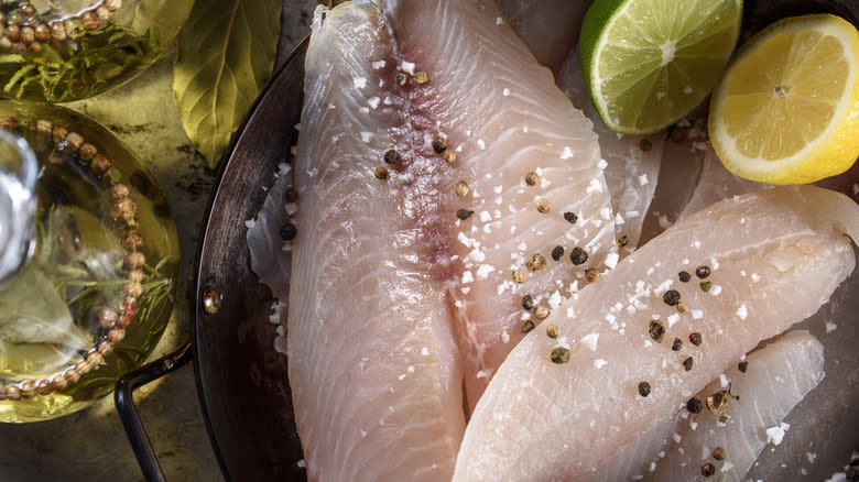 seasoned tilapia fillets on plate