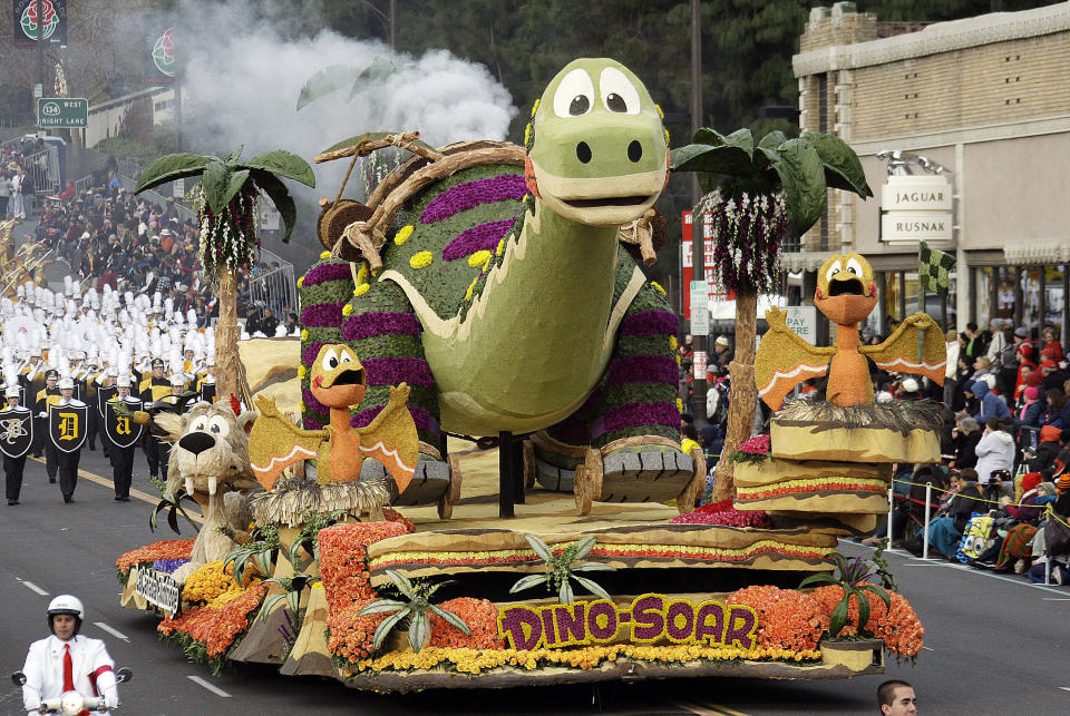 The La Canada Flintridge float "Dino-Soar," winner of the Animation trophy for the best display of animation, makes its way in the 124th Rose Parade in Pasadena, Calif., Tuesday, Jan. 1, 2013. (AP Photo/Reed Saxon)