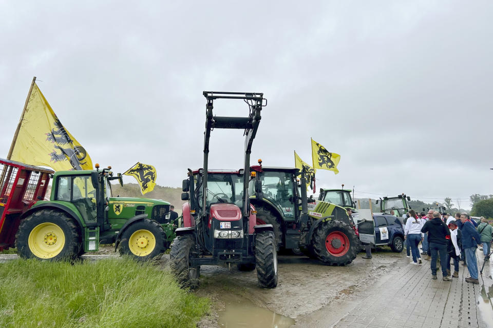 The Flemish Interest Party holds a demonstration for farmers protesting changes in farming policy in Beersel, Belgium, Friday, May 31, 2024. Like other populist and hard right parties, the Flemish Interest Party has reached out to farmers ahead of the European Union parliamentary elections of June 6-9. Farming has turned out to be a pivotal election issue dividing right from left across the EU nations. (AP Photo/Raf Casert)