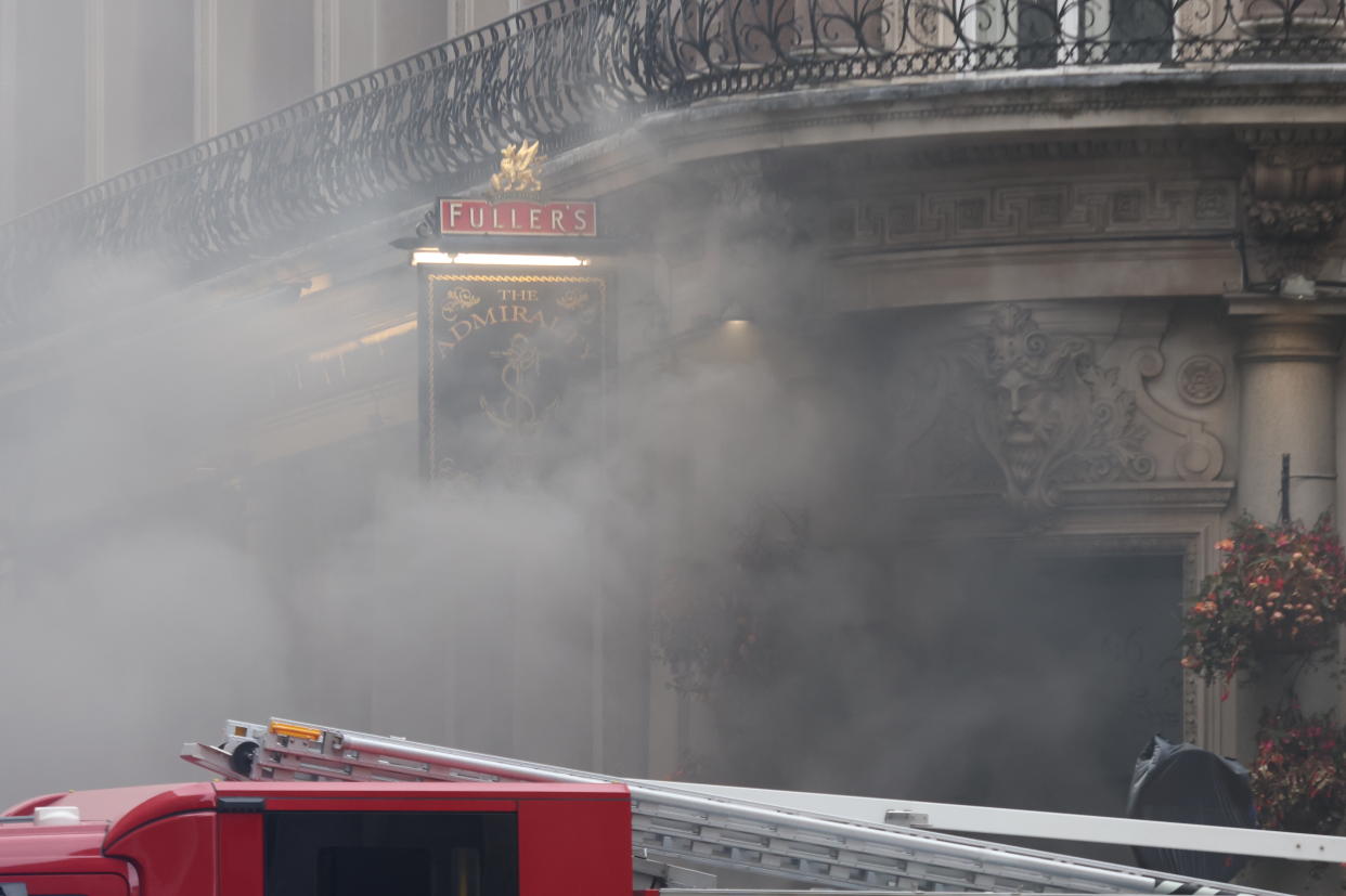 Emergency services at the scene of a blaze in the basement of the Admiralty pub in Trafalgar Square, London. Picture date: Tuesday July 12, 2022. (Photo by James Manning/PA Images via Getty Images)